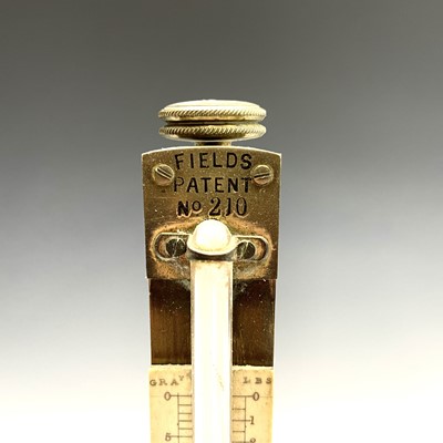 Lot 43 - A Field's patent brass hydrometer, with...