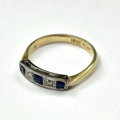 Lot 756 - An 18ct gold and platinum diamond and sapphire...