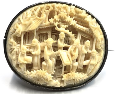 Lot 254 - A Chinese Canton carved ivory brooch, 19th...