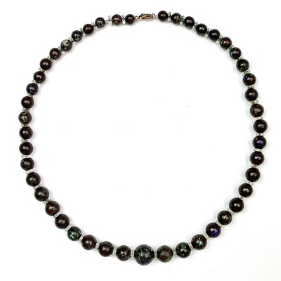 Lot 813 - A boulder opal graduated bead necklace, each...