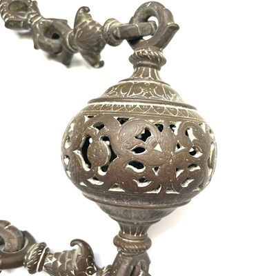 Lot 1038 - An Islamic bronze hanging incense burner,...