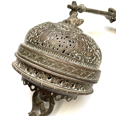 Lot 1038 - An Islamic bronze hanging incense burner,...