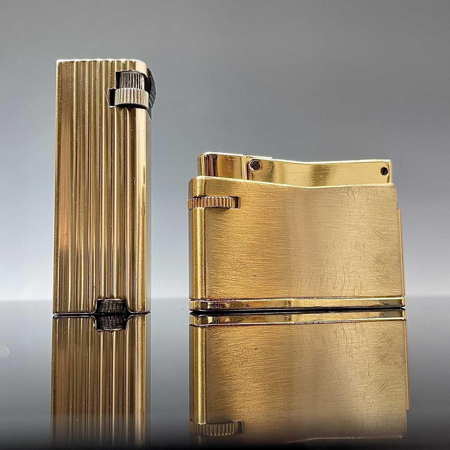 Lot 212 - A 1940's gold plated lighter by Benlow Golmet,...