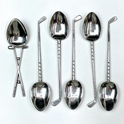 Lot 145 - A 1960's silver set of five golf spoons, maker...