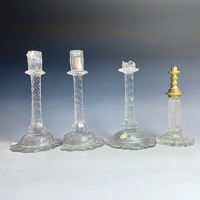 Lot 1038 - A suite of three Georgian cut glass...