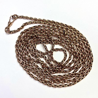 Lot 820 - A 9ct gold belcher link long guard chain,...