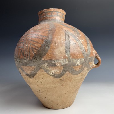 Lot 252 - A Chinese Neolithic terracotta vase, with a...