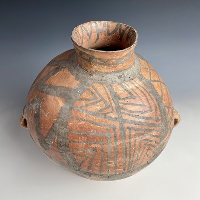 Lot 252 - A Chinese Neolithic terracotta vase, with a...