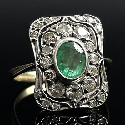 Lot 620 - An Edwardian gold and platinum emerald and...