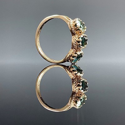 Lot 835 - A 9ct hallmarked gold tourmaline three stone...