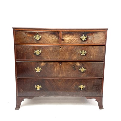 Lot 3060 - A Georgian mahogany chest of two short and...