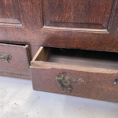 Lot 157 - A George III oak mule chest, the rectangular...