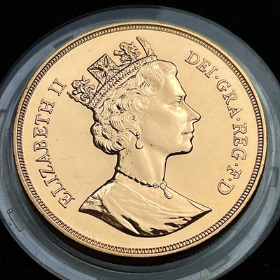 Lot 773 - A 1988 United Kingdom 22ct £5 proof coin,...