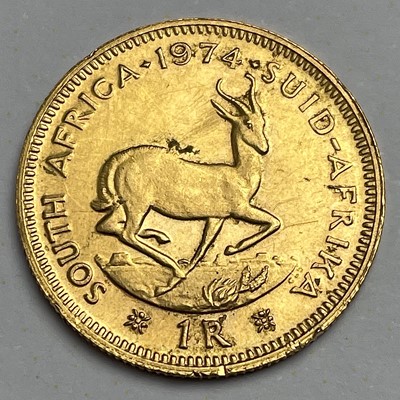 Lot 705 - A 1974 1 Rand 22ct gold coin, 4g.