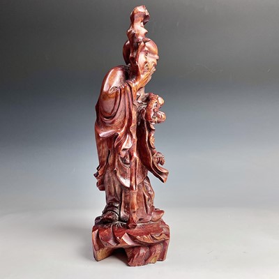 Lot 108 - A Chinese hardwood carved figure of a man with...
