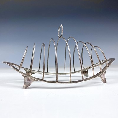 Lot 146 - A George III silver eight section toast rack...