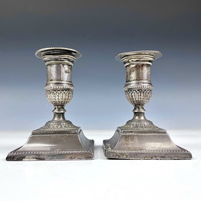 Lot 149 - A pair of Victorian silver squat candlesticks...