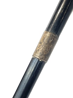 Lot 236 - A Victorian ebonised walking stick, with...