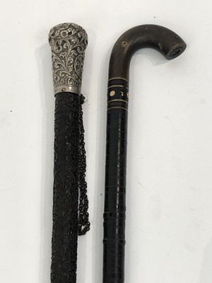 Lot 238 - An Indian carved ebony walking stick, circa...