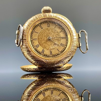 Lot 933 - An early 20th century 14k lug wristwatch, the...