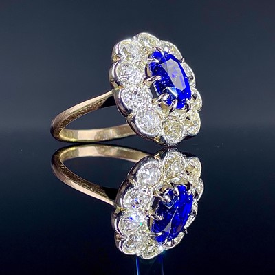 Lot 851 - An 18ct and platinum sapphire and diamond...
