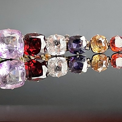 Lot 703 - An exquisite 9ct multi gemstone set bracelet,...