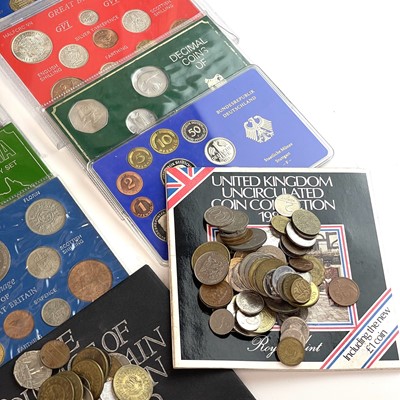 Lot 135 - Proof and Uncirculated Coin Sets. Containing:...