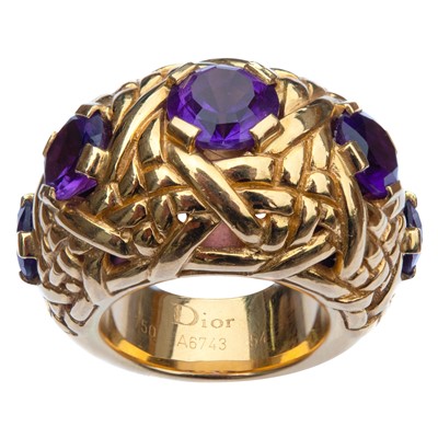 Lot 546 - An extravagant Christian Dior 18ct gold amethyst set heavy five stone ring.