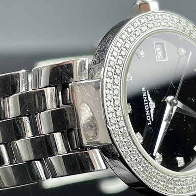 Lot 374 - A Longines ladies stainless steel diamond set...