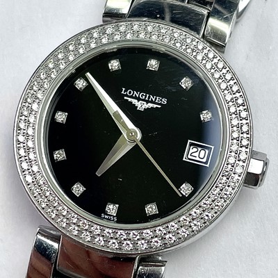 Lot 374 - A Longines ladies stainless steel diamond set...