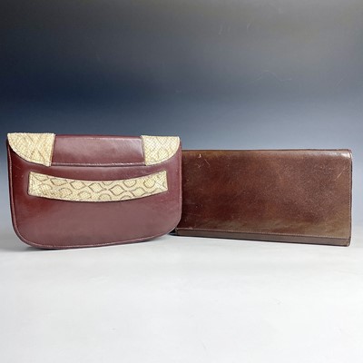 Lot 1033 - An Etienne Aigner brown leather clutch bag,...