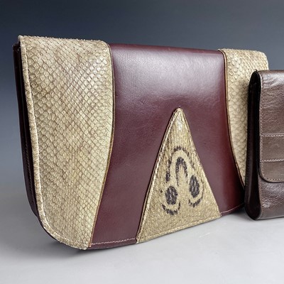 Lot 1033 - An Etienne Aigner brown leather clutch bag,...