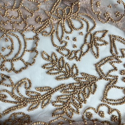 Lot 1063 - Megan Park, a pink netting beaded evening...