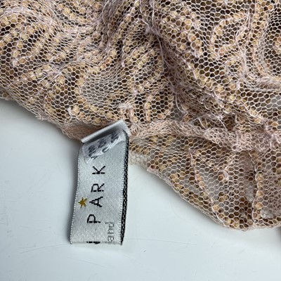 Lot 1063 - Megan Park, a pink netting beaded evening...