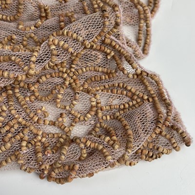 Lot 1063 - Megan Park, a pink netting beaded evening...
