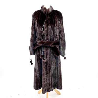 Lot 1043 - A good mink fur coat by Higgs Furs, with...