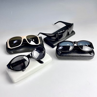 Lot 1049 - Versace, four pairs of sunglasses.