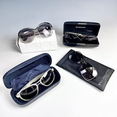 Lot 1052 - Four pairs of designer sunglasses including...