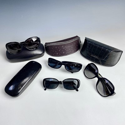 Lot 1066 - Four pairs of designer sunglasses including...