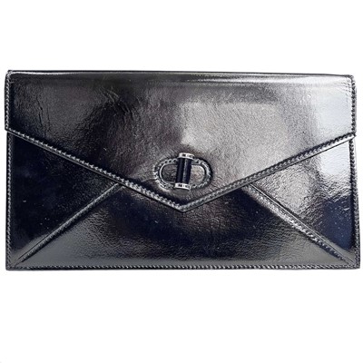 Lot 544 - Alexander McQueen, a black patent leather clutch bag, width 30cm.