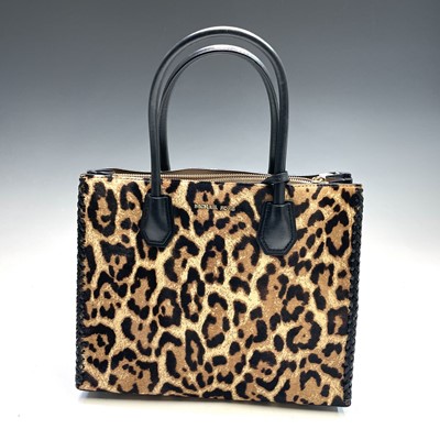 Lot 1027 - Michael Kors, a pony fur and leather leopard...