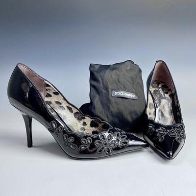 Lot 1001 - Dolce & Gabbana, a pair of black patent...