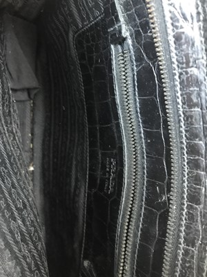 Lot 1046 - Prada, a black crocodile skin leather handbag,...