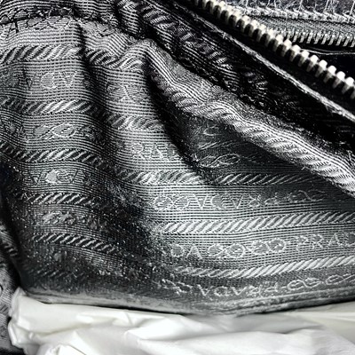 Lot 1046 - Prada, a black crocodile skin leather handbag,...