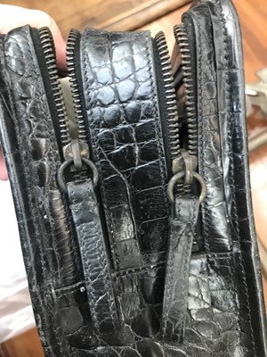 Lot 1046 - Prada, a black crocodile skin leather handbag,...