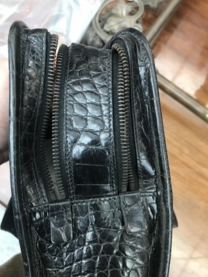 Lot 1046 - Prada, a black crocodile skin leather handbag,...