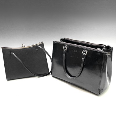 Lot 1032 - Anya Hindmarch, a black patent leather handbag,...