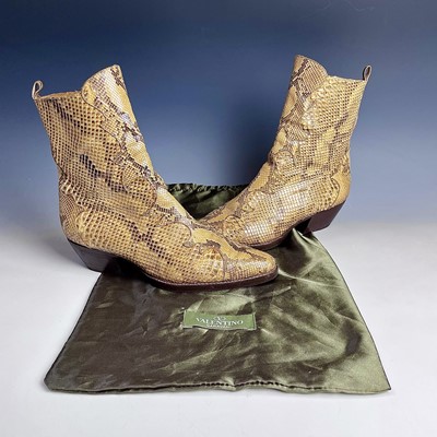 Lot 993 - A pair of snake skin leather boots, size 6.5,...