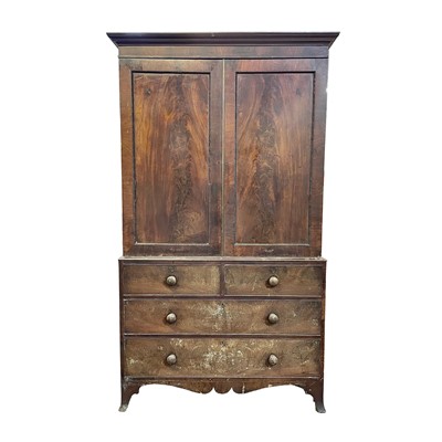 Lot 3186 - A late George III mahogany linen press, with...