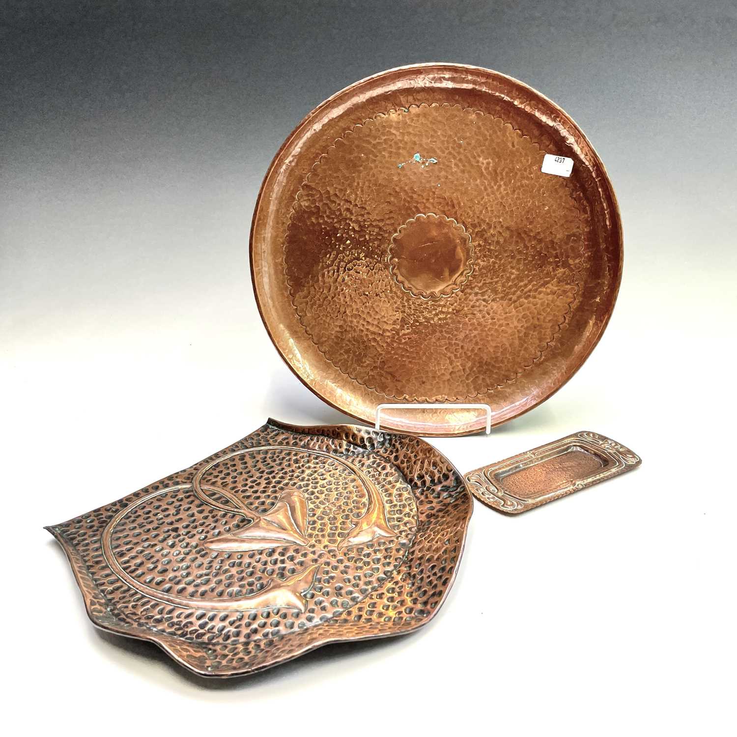 Lot 228 - A Newlyn copper circular tray, with planished...